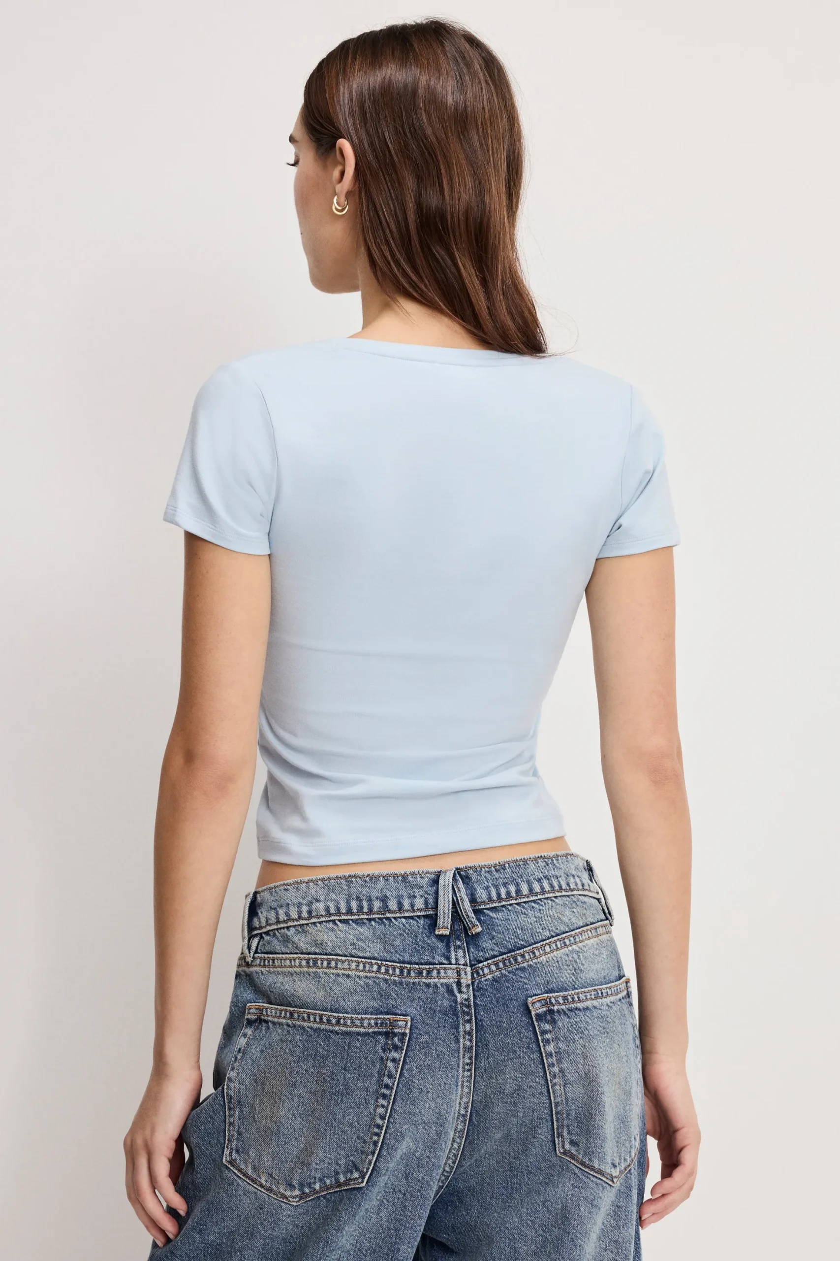 super stretch v neck baby tee